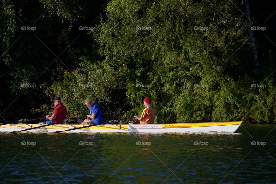 People Having Fun Rowing