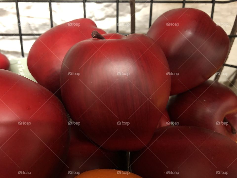 These apples definitely look good enough to eat, hardly possible though as they are not real ones.