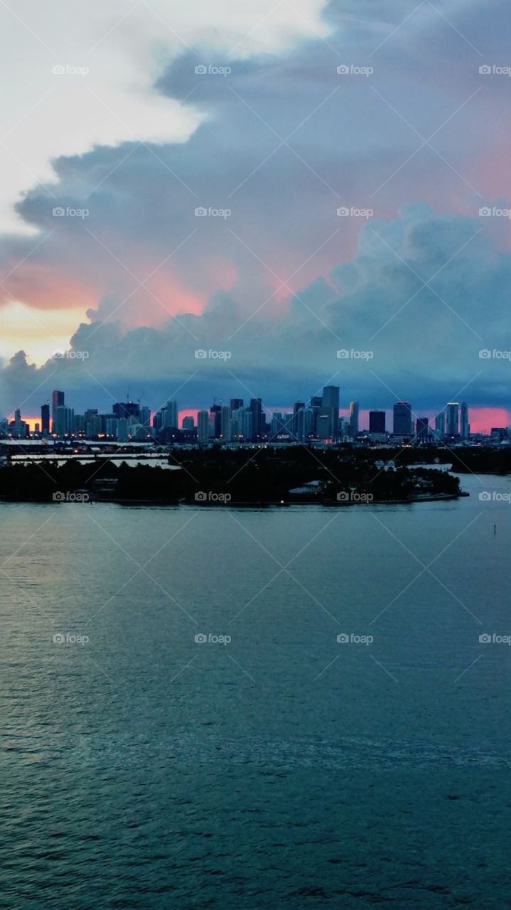 Dusk setting in Over Miami Florida View from Mondrian resort hotel 16th floor South Beach