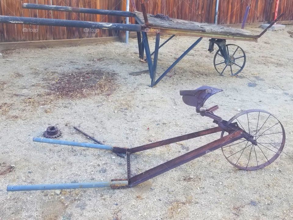 Wood Vs. Metal

old metal plow and farm equipment