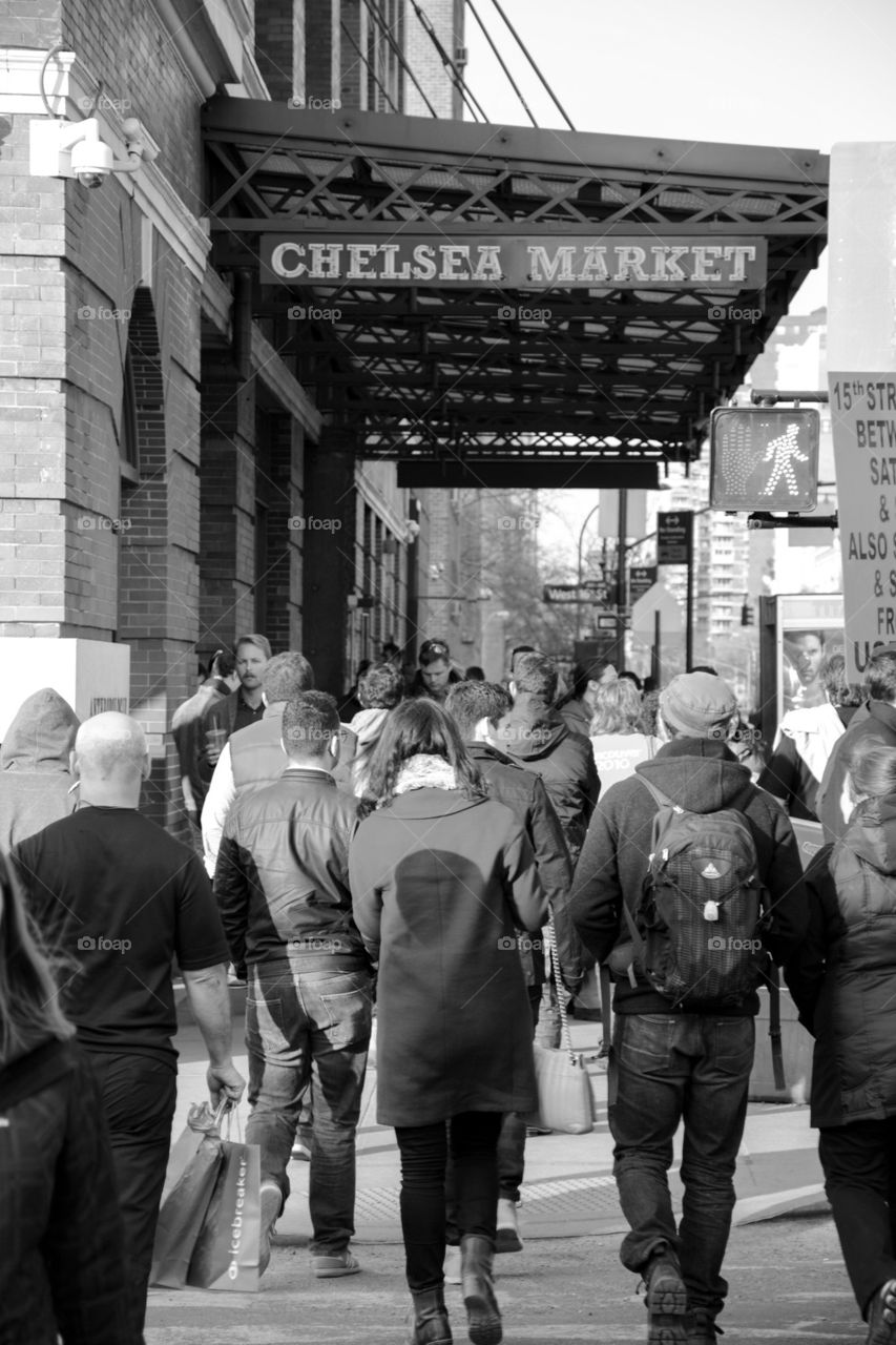 people walking  Chelsea market, new York