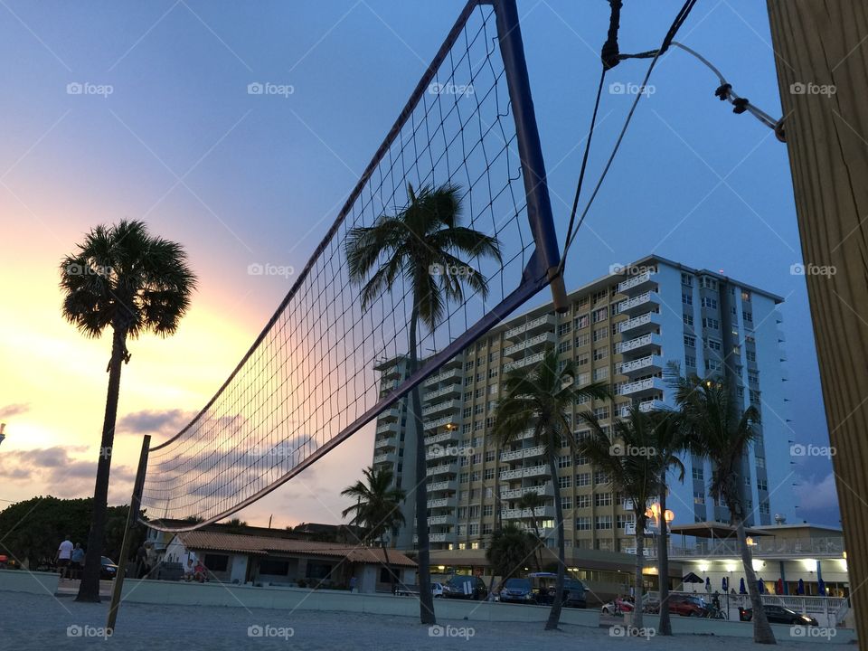 Hollywood Beach . Volleyball net and building behind at sunset, Hollywood Beach, Florida, USA 