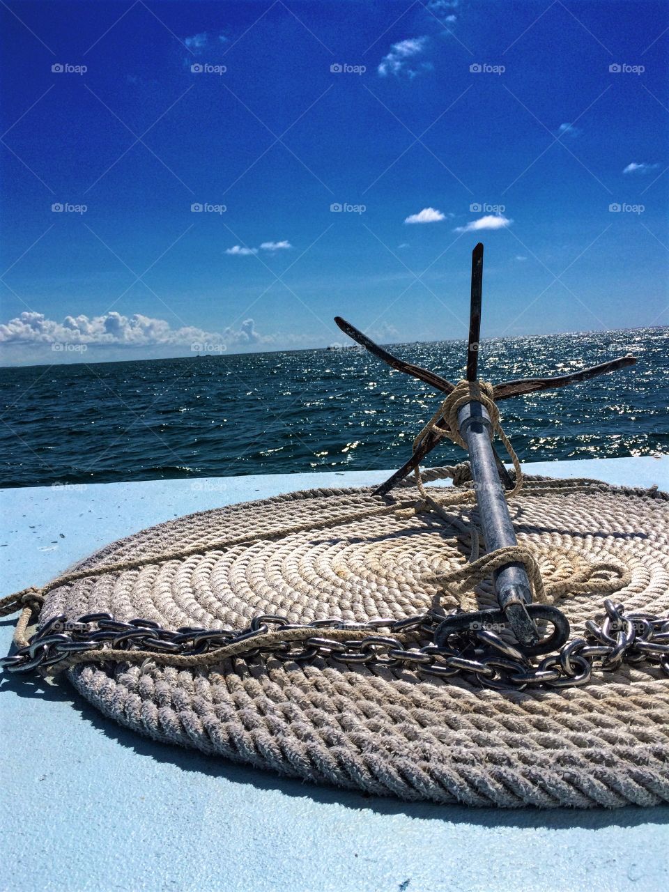 View of an old anchor in front of sea