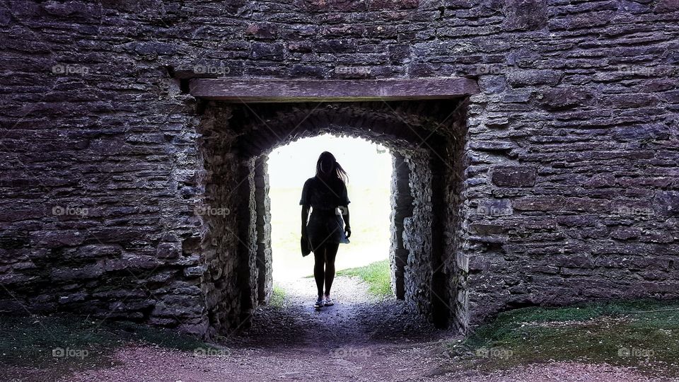 framed within the doorway of Dinefwr castle, Wales.