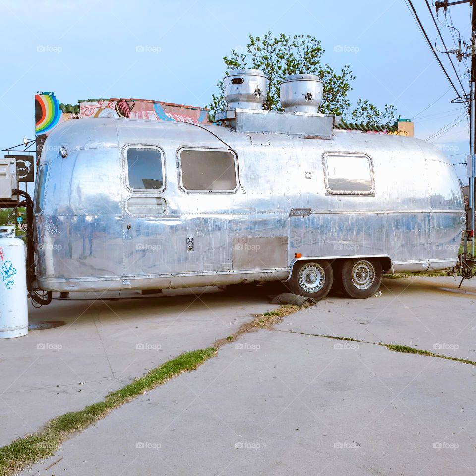 A vintage aluminum camper/  travel trailer spotted.