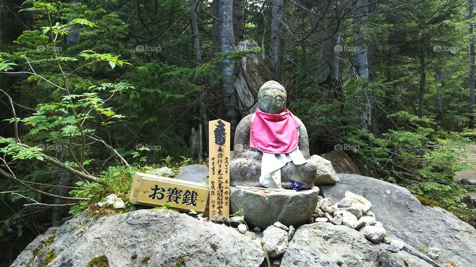 stone god in mountain
