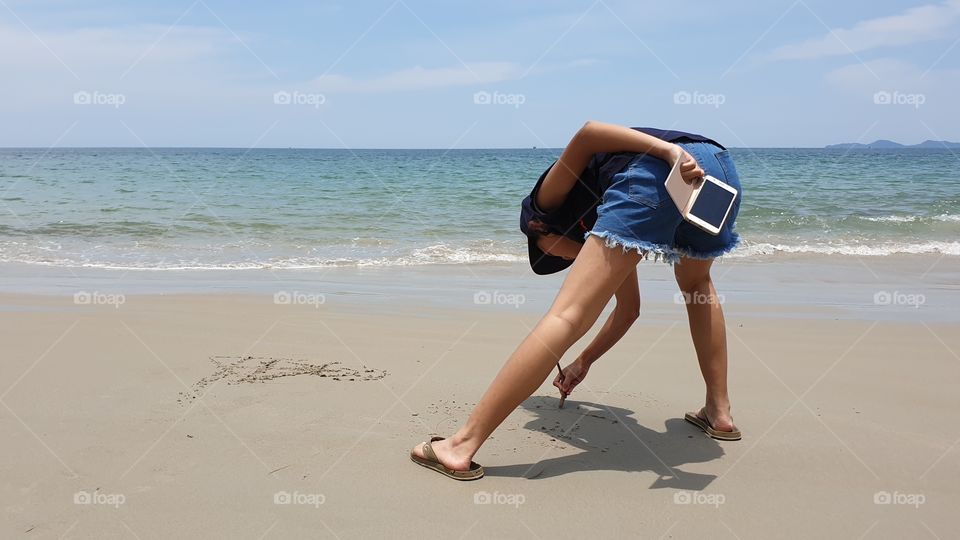 Girl On Sandy Beach