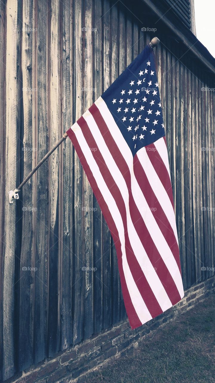 flag and barn