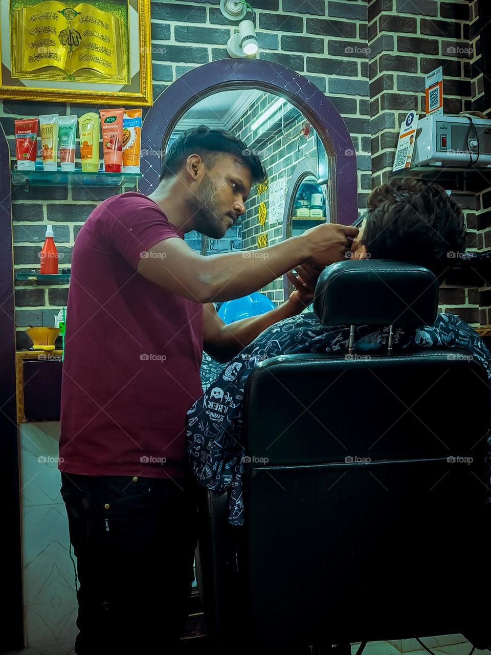 Barber setting beard