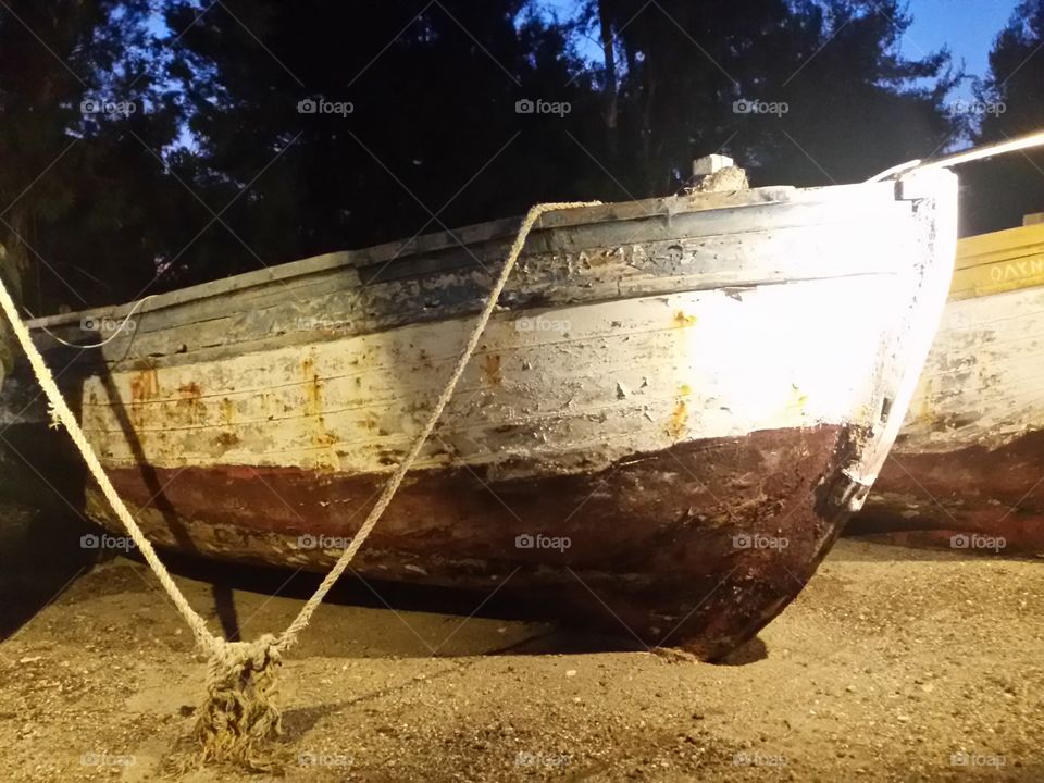 Old wooden boats on the coast