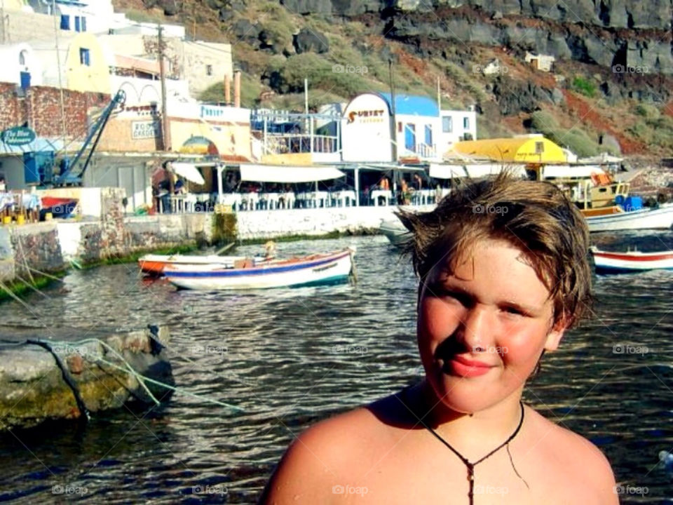 Boy at a beach at Santorini. Boy at a beach in Santorini in Greece