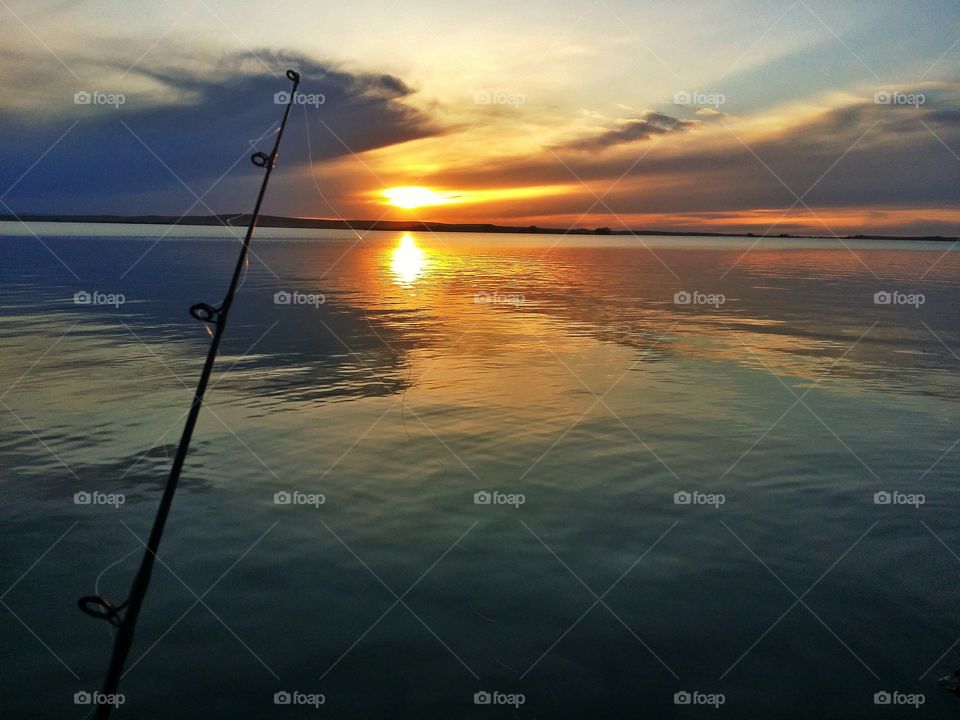 Beautiful sunset while fishing . South Dakota 
