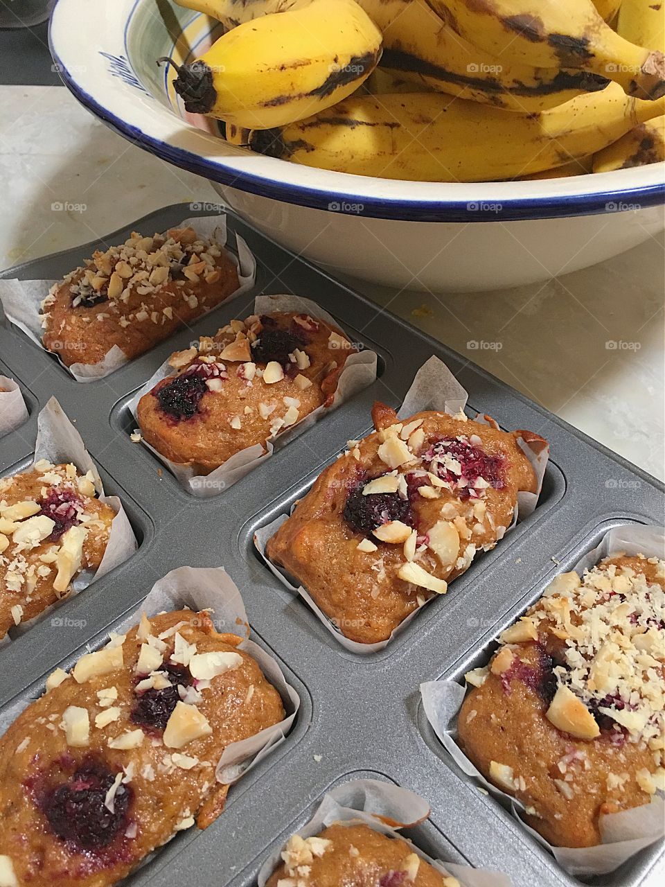 Mini Banana and wild Blackberry Bread Loaves, with organic coconut sugar and topped with crushed macadamia nuts