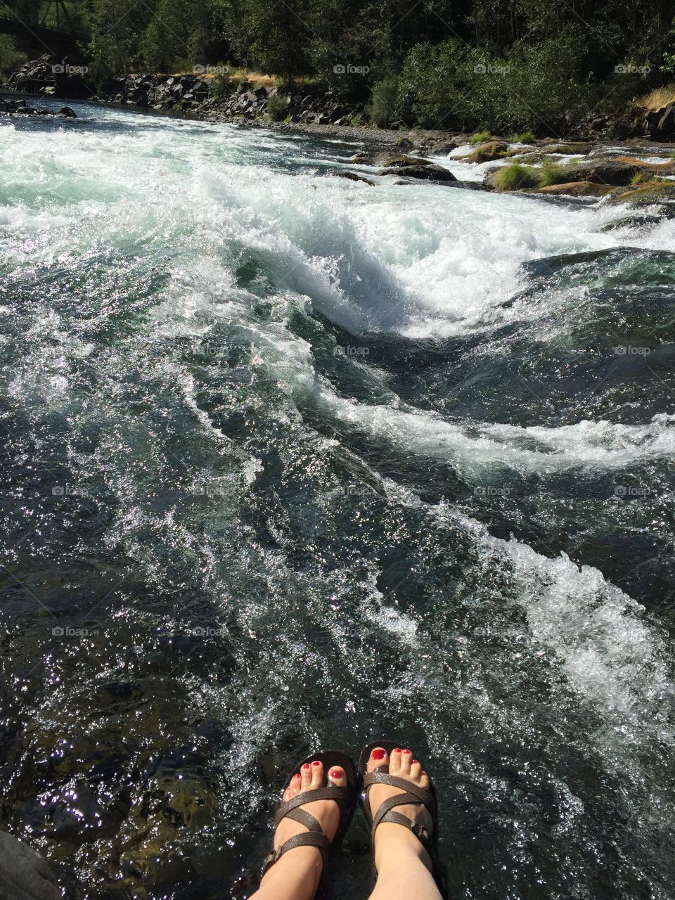 Feet by the whitewater