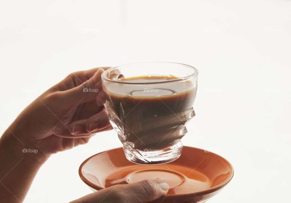 hot drink with white background (the outside covered with snow)