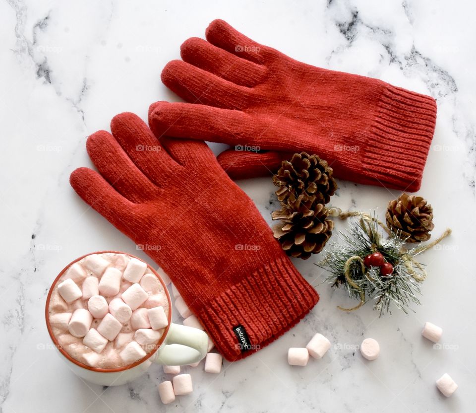 Red Isotoner gloves still life flat lay Christmas theme