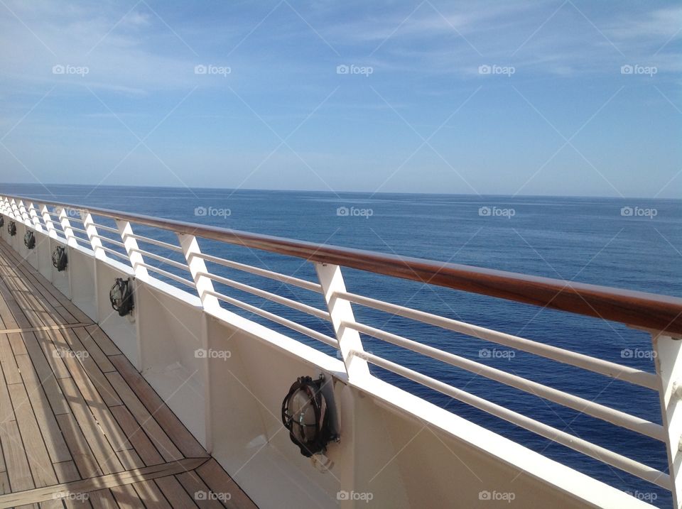 Looking out to sea. Aboard a yacht with a beautiful calm view of the sea and horizon