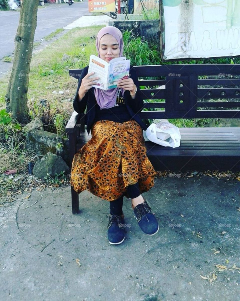 a woman reading book