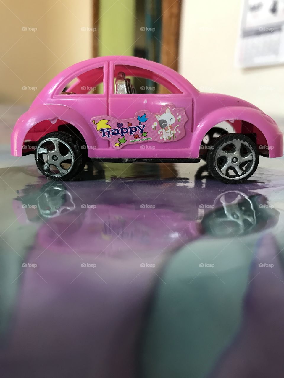 Girly pink toy car 