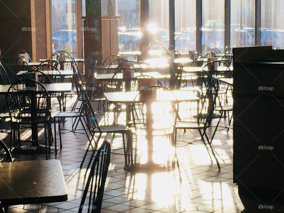 Mystical light of the day Inside a restaurant in winter 