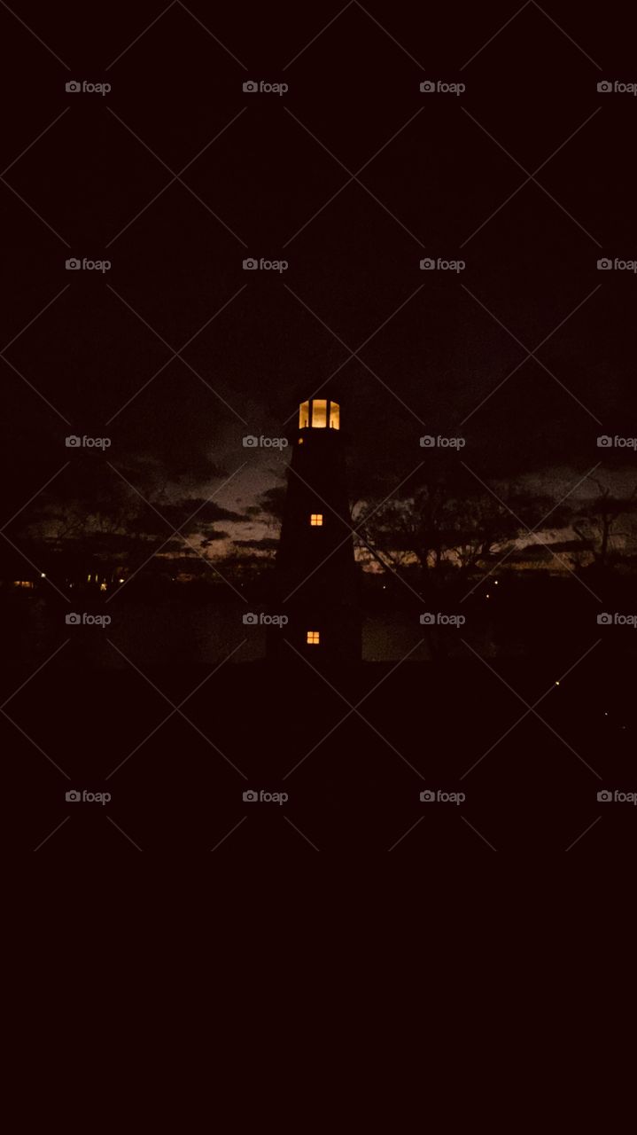 Night is upon this picture of Lighthouse extremely cloudy this night. Featured with Dark presence. 