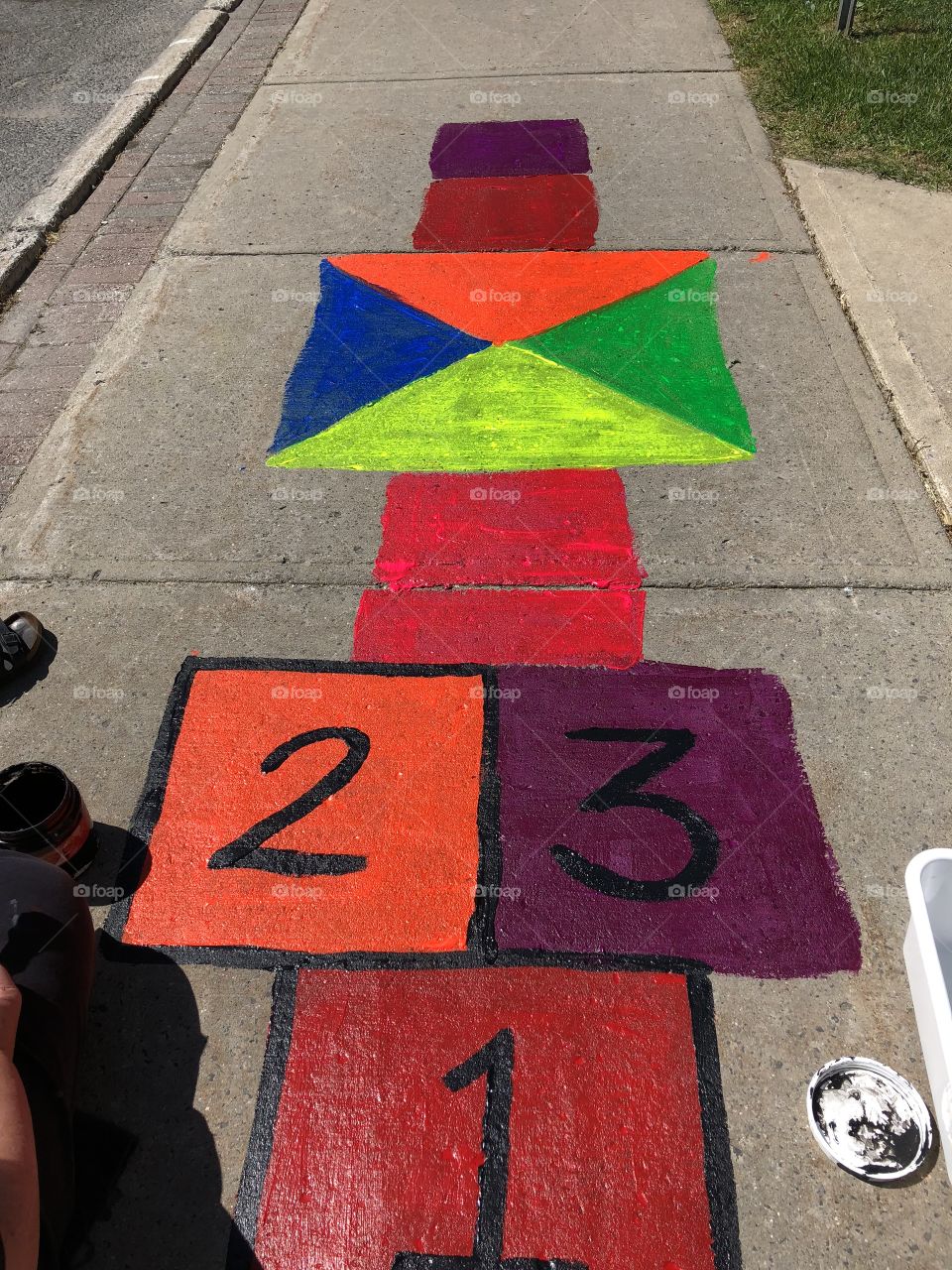 Brightly painted hop-scotch -time to play - Young & old 