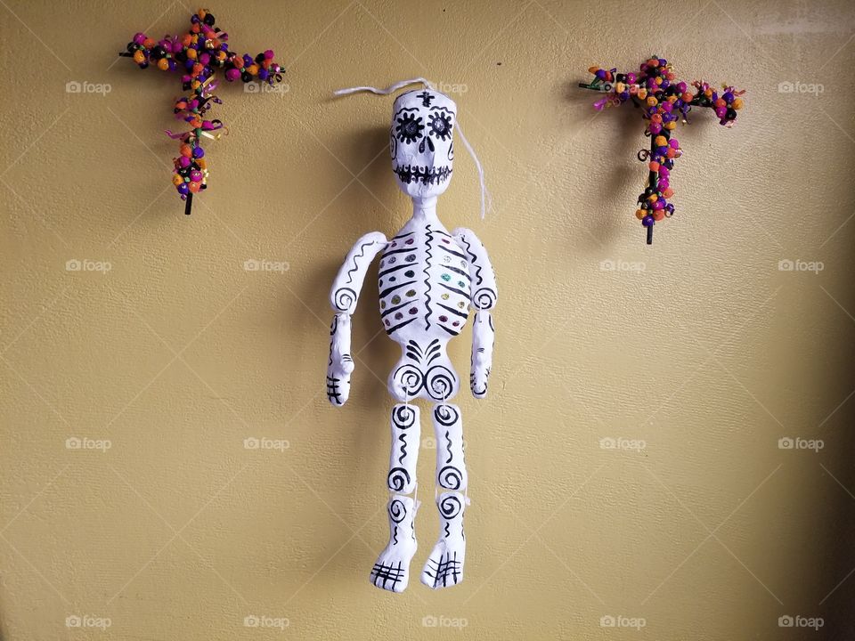 Day of the dead skeleton and crosses