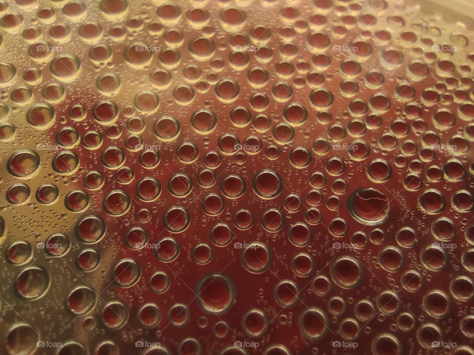 Condensation drops on the surface close-up