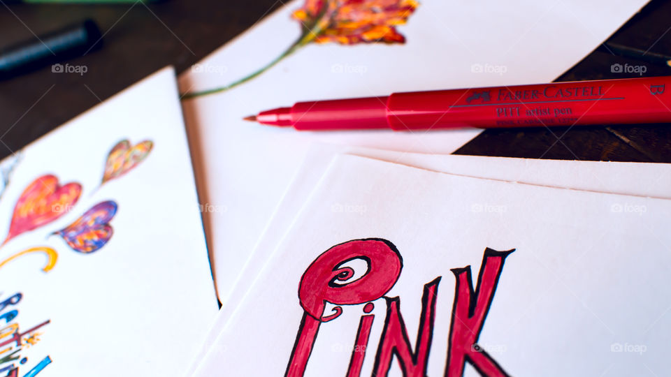 Pink Carmine 127 Faber-Castell PITT artist pen wishing for spring with tulip art in background on card and word pink colored on paper 