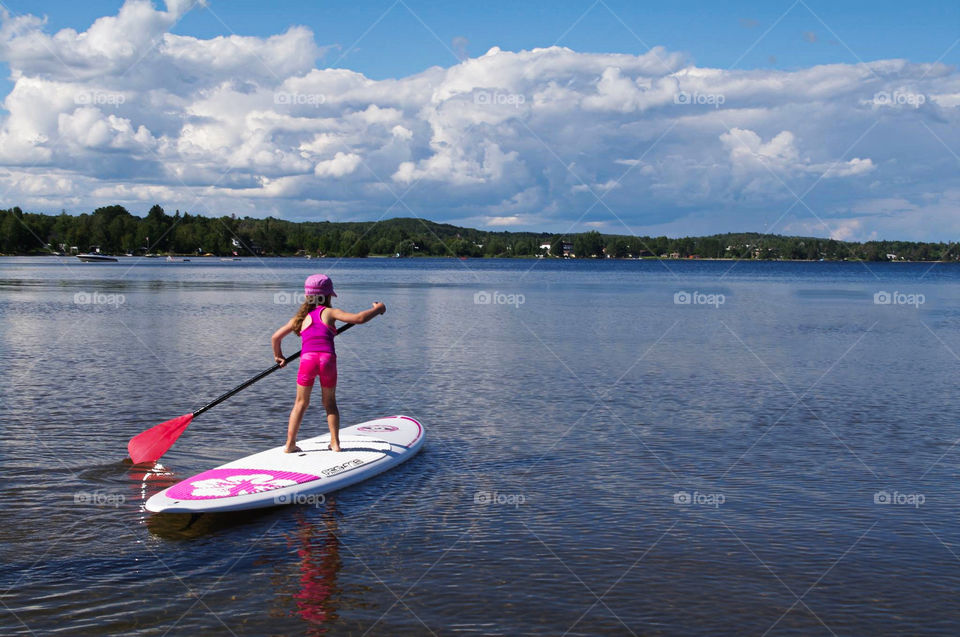 Day time paddle boarding on Lake Bernard in the heart of Cottage Country
