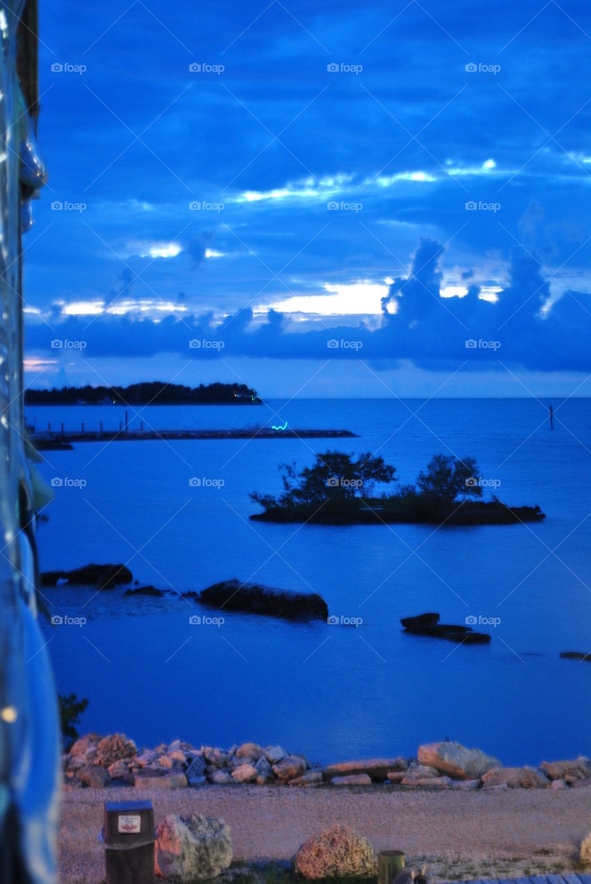 Beautiful blue ocean water at dusk