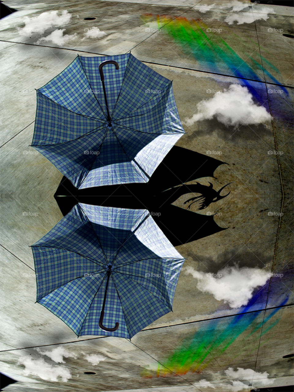 Twin Umbrellas. A reflective photo gives two umbrellas after the rain has passes.