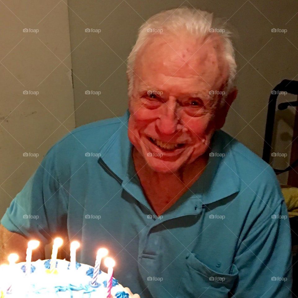 Grandfather with birthday cake, happy, homemade.