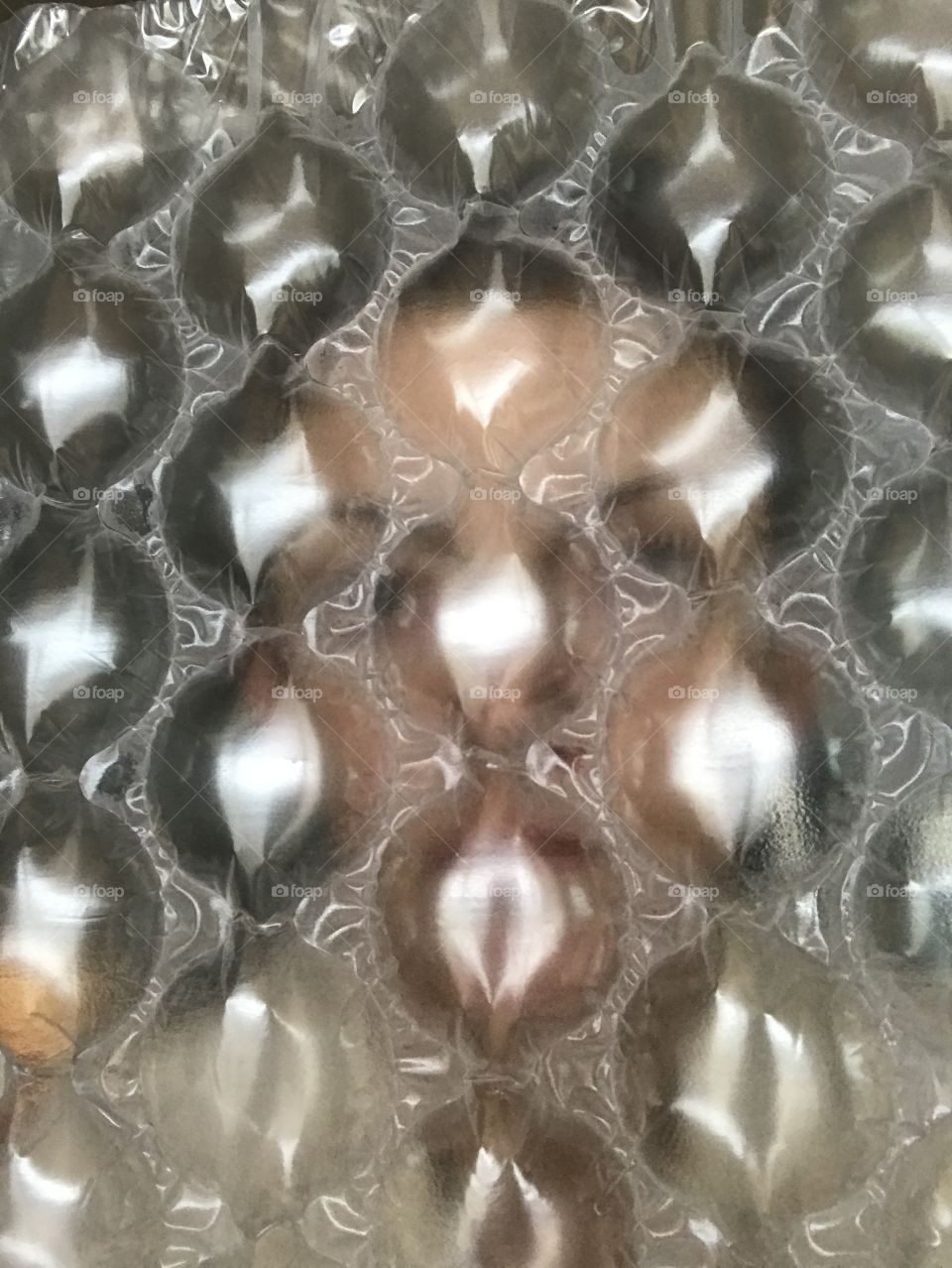 Blurred bubble wrap face 