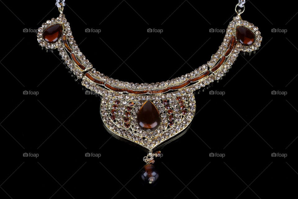 Indian jewelry on black background