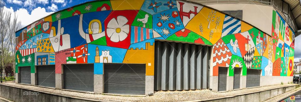 Panoramic view of a mural by Joao L Costa Rosa, celebrating the Festa Dos Tabuleiros in Tomar, Portugal 