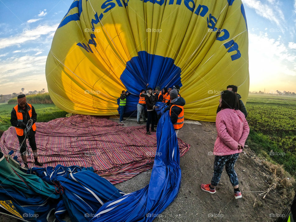 Balloon staff team are trying to control balloon down