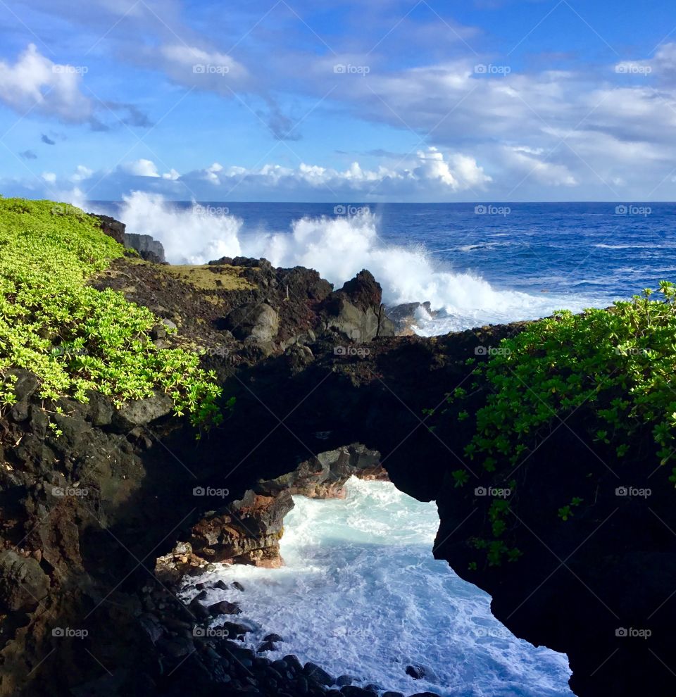 Sea arch by the sea cliffs