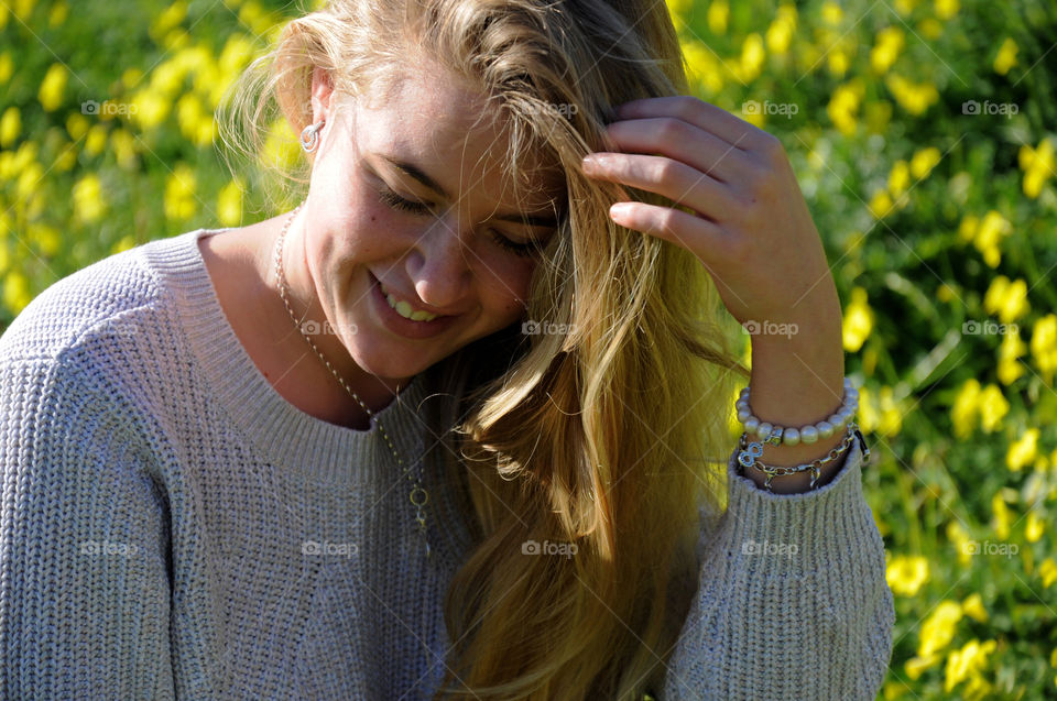 Girl in a field of flowers