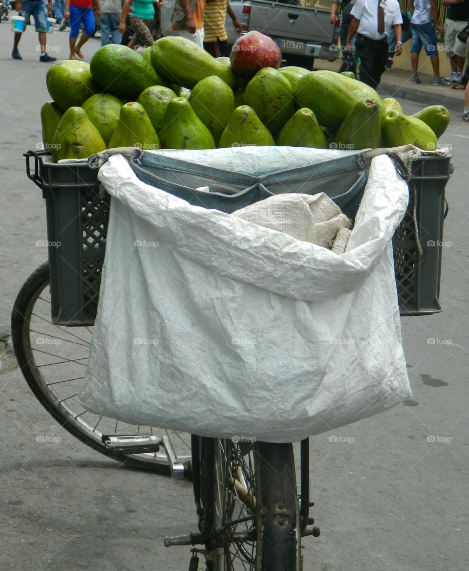 Cuba: Avocados for sale! As I see Santiago de Cuba in black and white, and sometimes in color! Cuba is a special destination and people know how to enjoy themselves, despite obvious signs of poverty and hardships. The streets are filled with vibrant colors and rhythm and it is not uncommon to see people dancing in the streets and alleys to the sound of loud salsa music! Wish I could, but It's impossible to capture it all! 