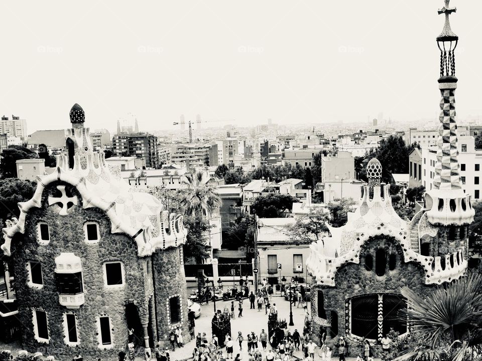 Landscape photo of Parc Guell, a privatized park system composed of gardens and architectural elements located on Carmel Hill, in Barcelona, Catalonia, Spain. architecture of Gaudi
