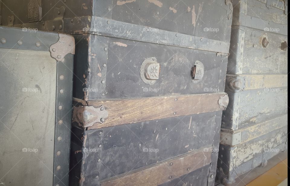 A row of antique travel trunks on display at the Niles train station museum