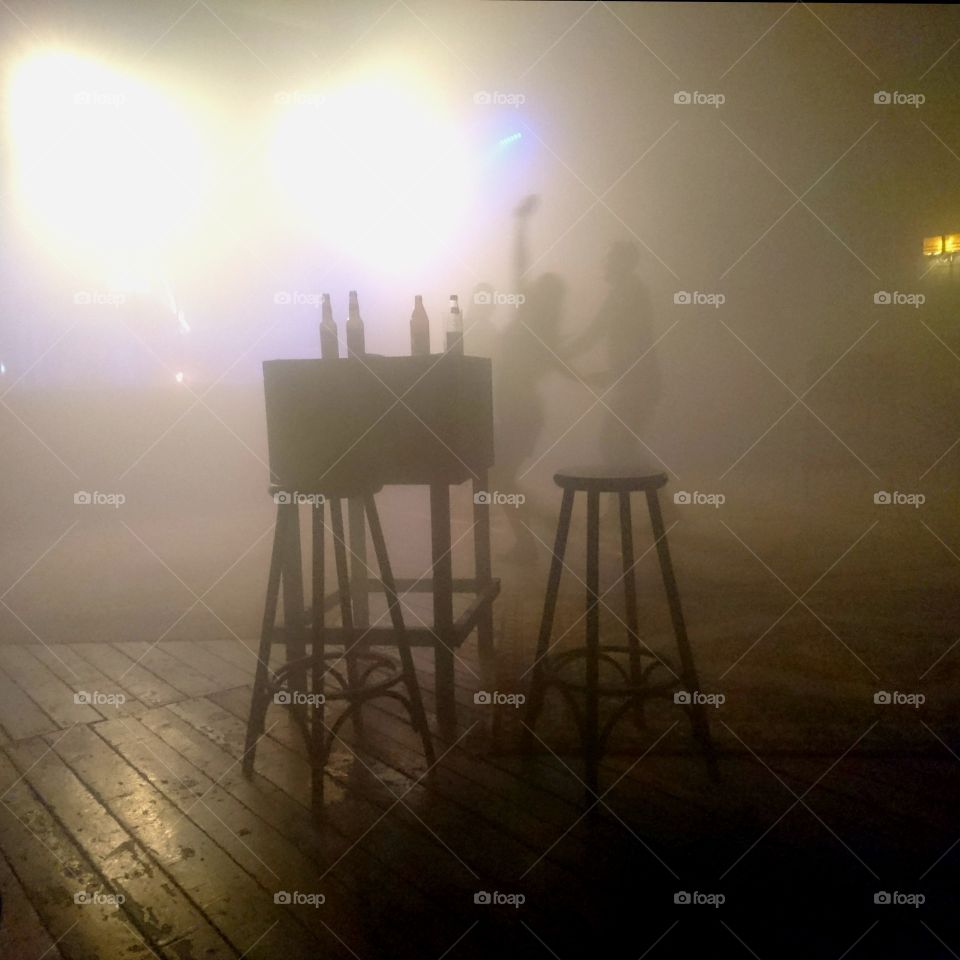 nightclub scene with silhouettes