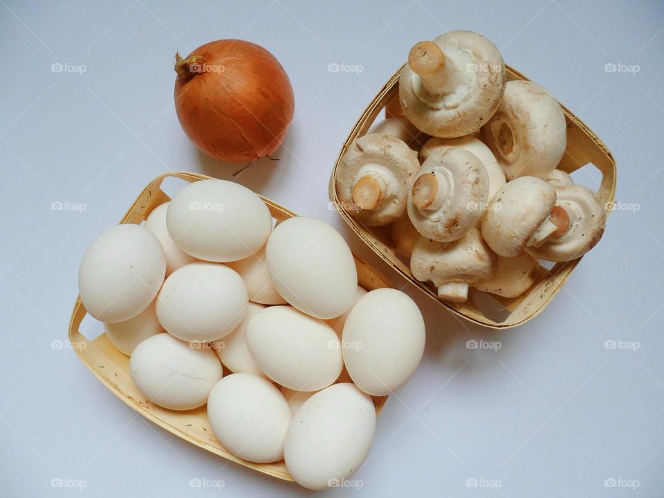 eggs, mushrooms and onion on the table