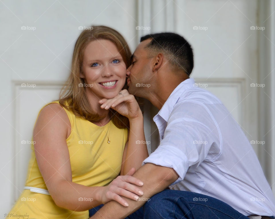 Engagement session. Adorable couple posing for engagement pics