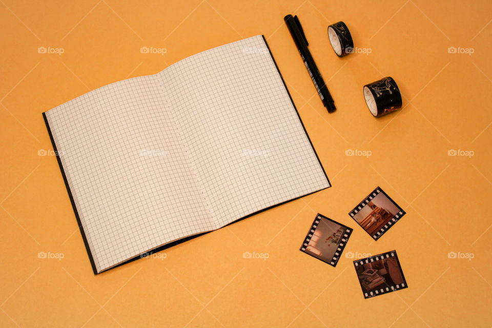 Notepad and polaroids