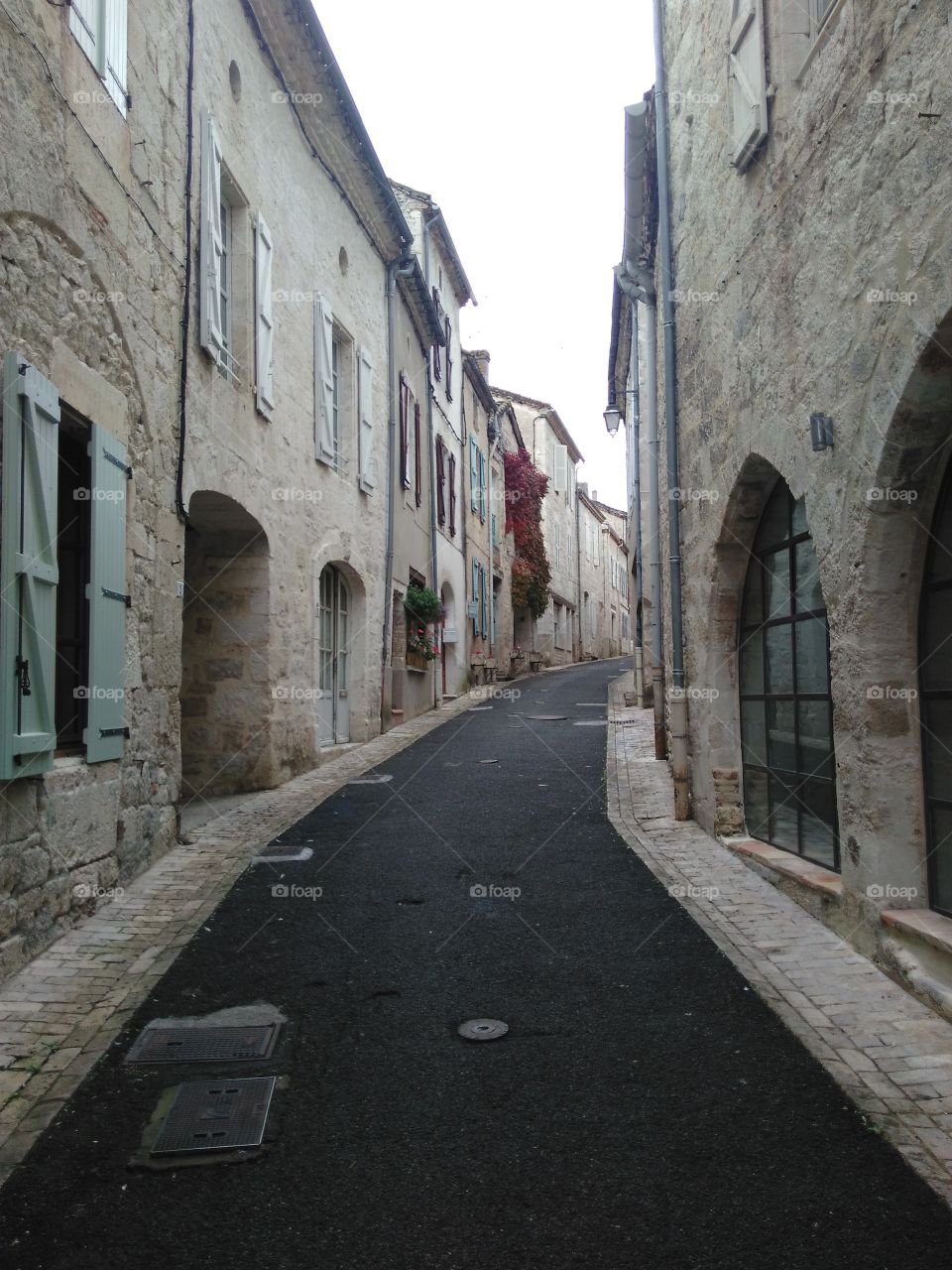 Little street in the town of Moncuq, in France.