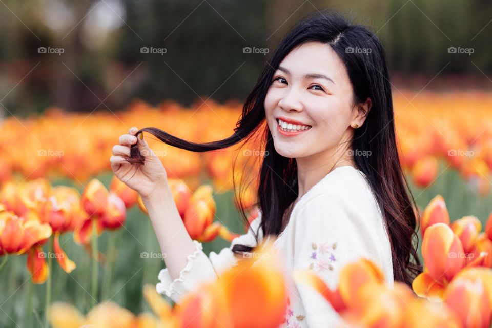 Beautiful Asian woman at spring 