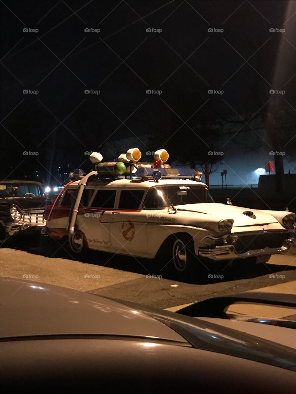 Ghostbusters car set up by neighbor for halloween.