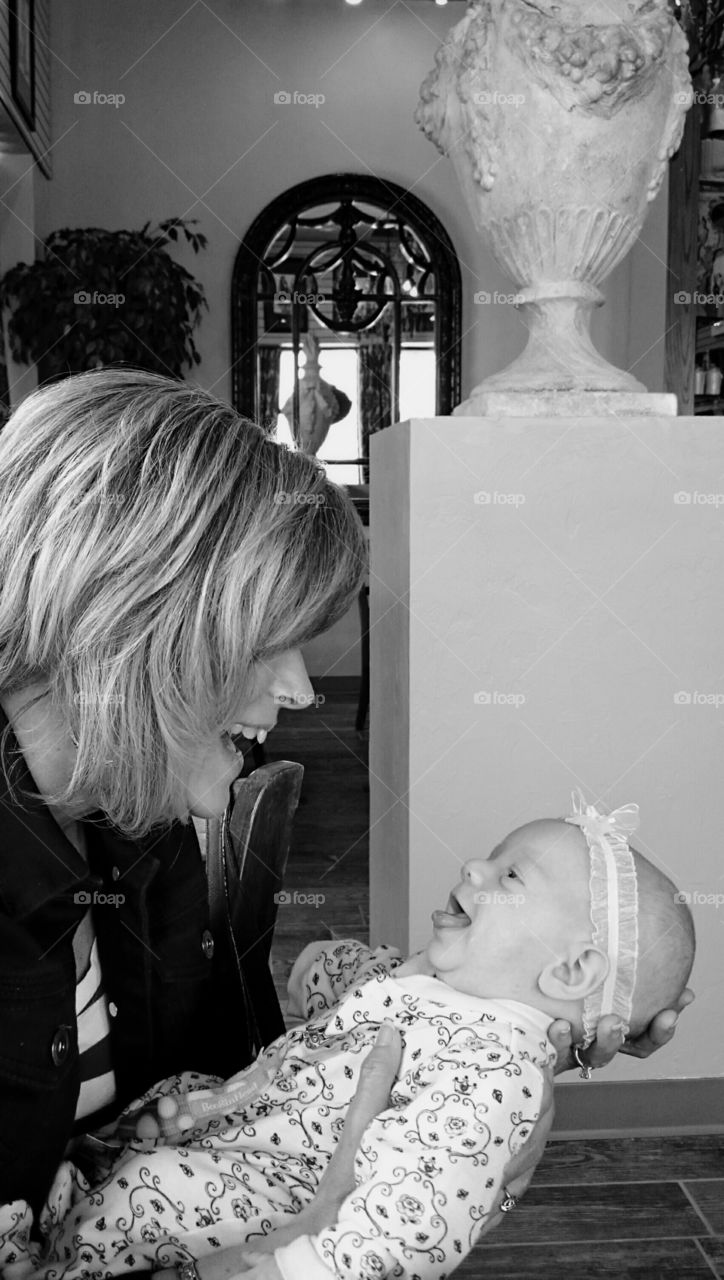 All Smiles. Marley smiles at her grandmother during lunch. 